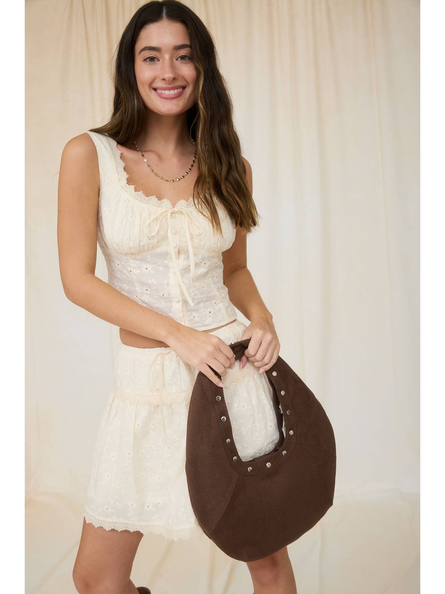 Eyelet Spring Button Top