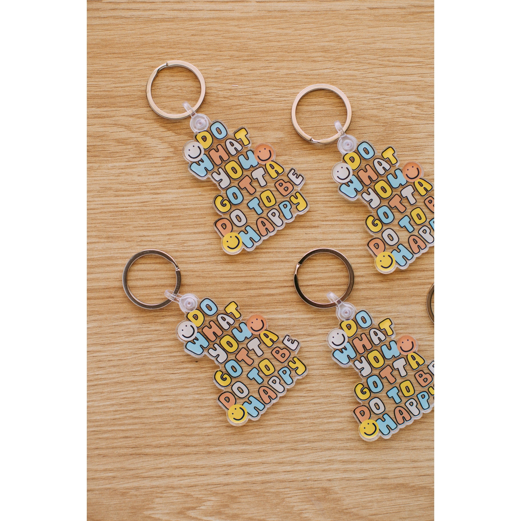 To Be Happy Keychain,ACCESSORIES,KEYCHAINS, SMILEY FACE- DEFIANT